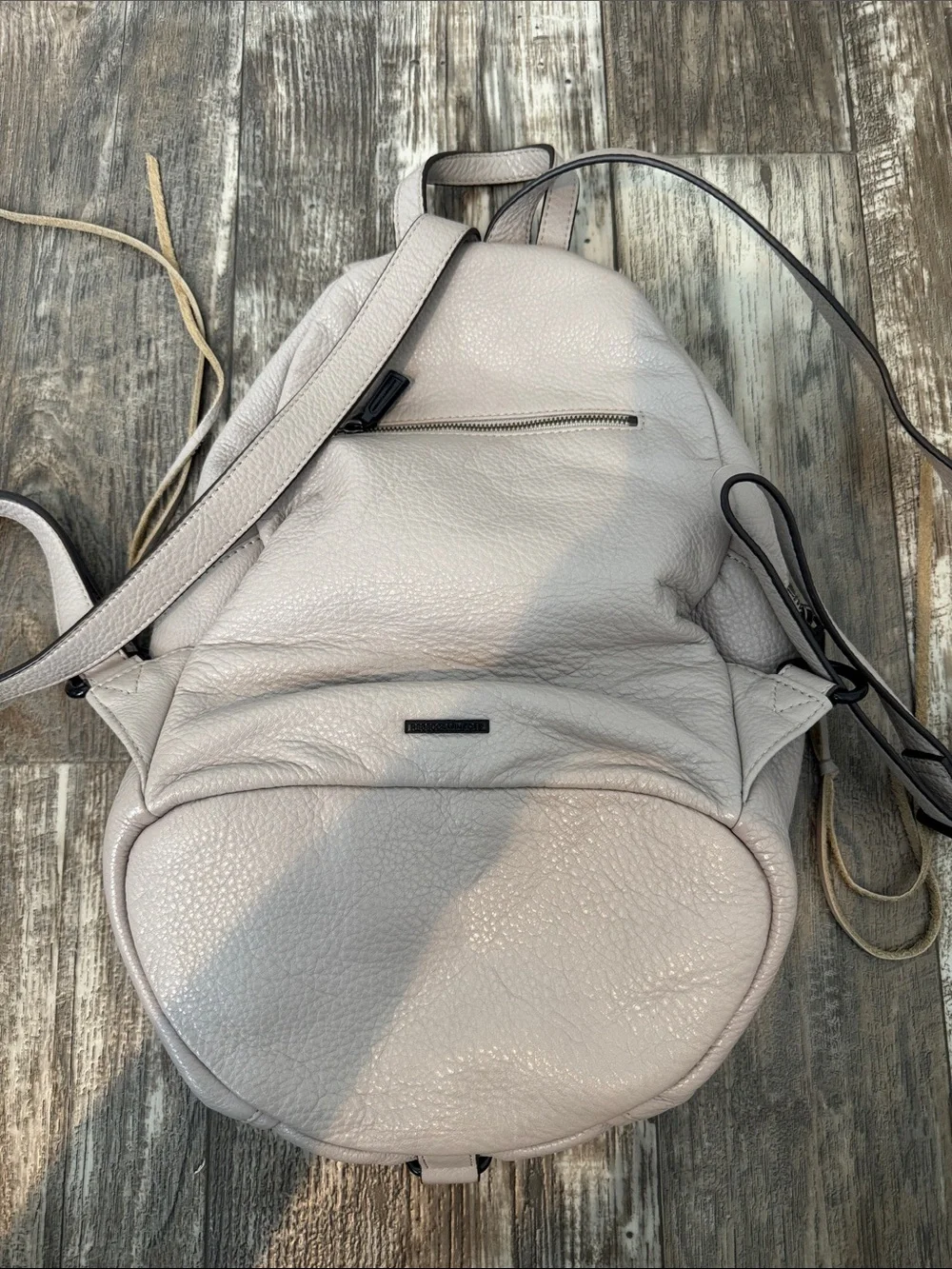 Leather Sling Backpack in Light Taupe